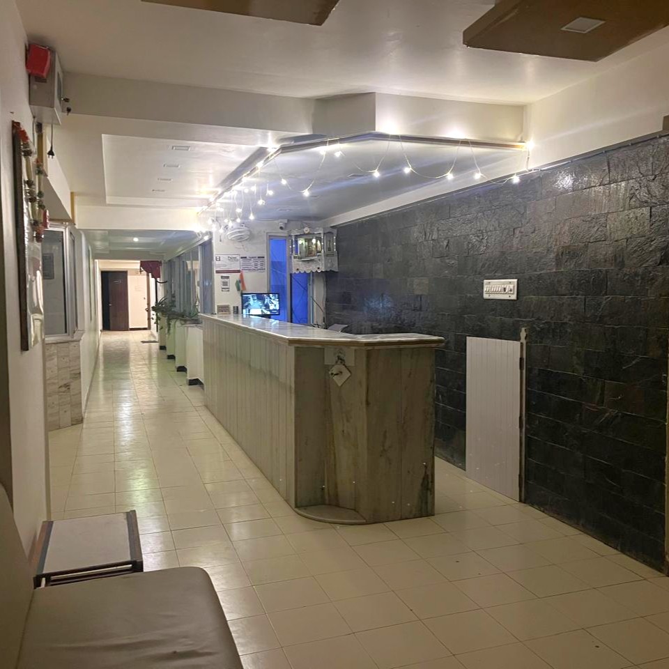 Reception area of Shree Paras White Hotel in Amreli